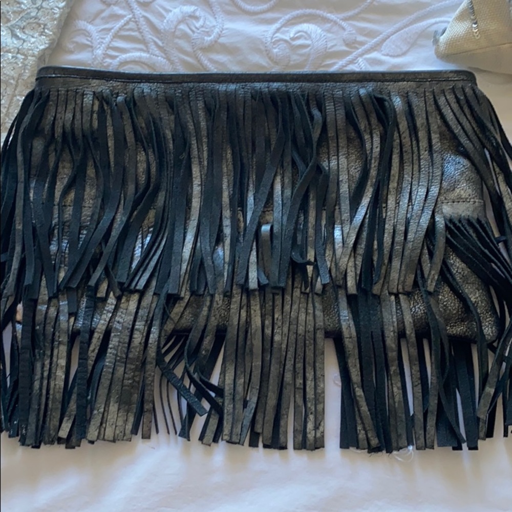 Leather clutch with fringe